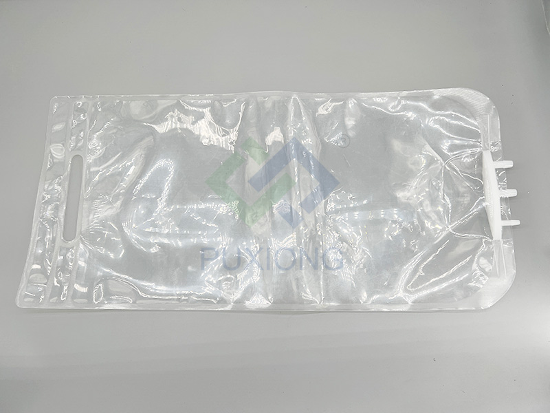 Two multi-layer co-extruded films are heat-sealed and welded at one time to form a bag