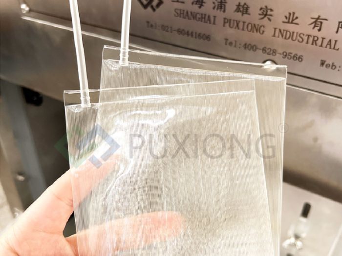 How are PVC blood bags produced by heat sealing